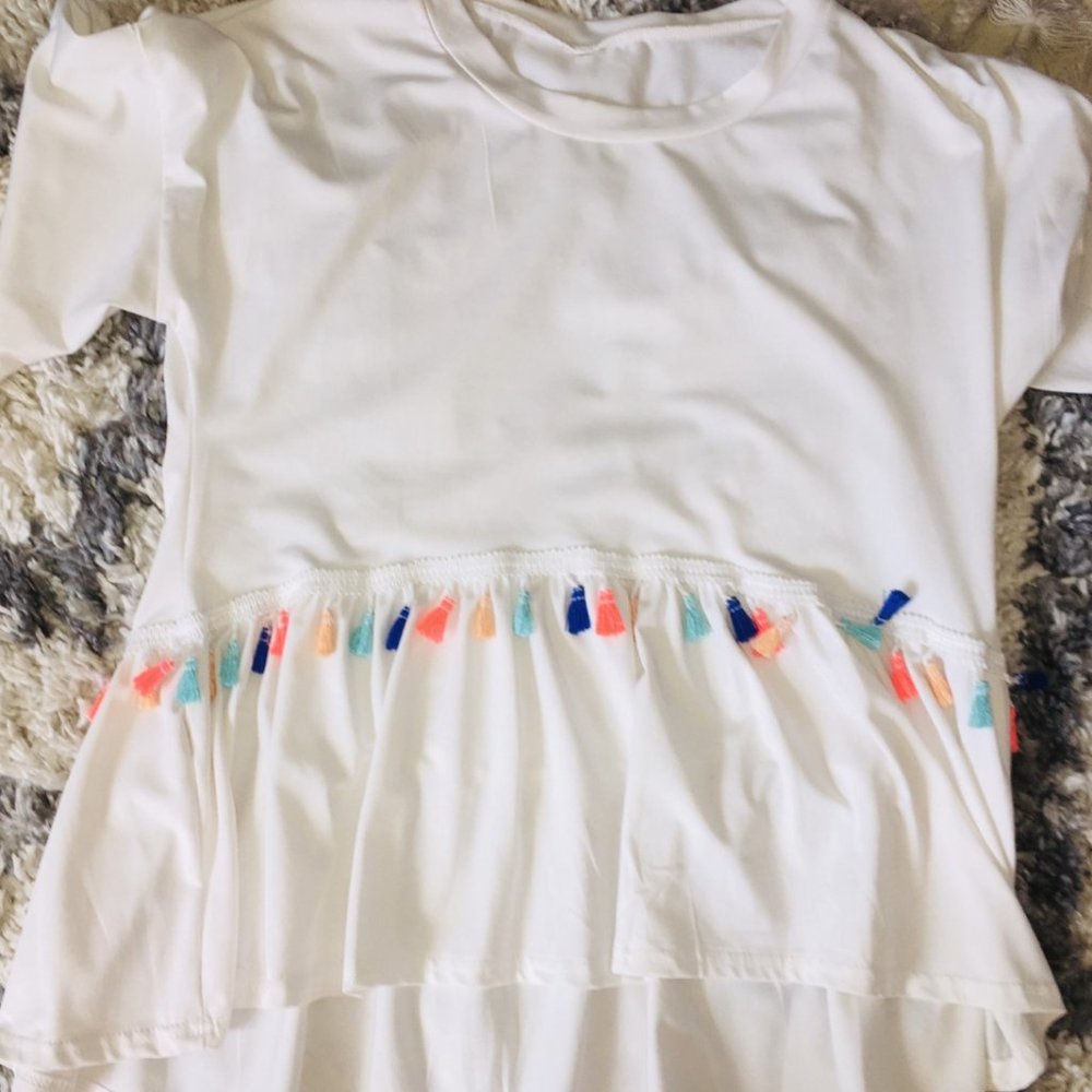 White tasseled top